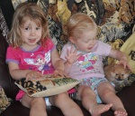 grandchildren with Dochlaggie pomeranian puppies